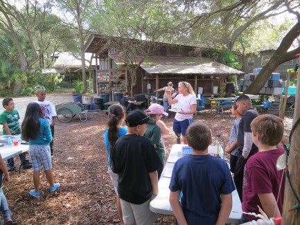 Jan 2013 Dana with students on stage